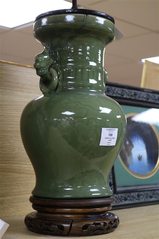 A Chinese celadon green glazed lamp